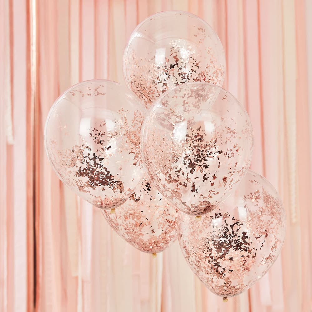 Balloons with 'ripped' rose gold confetti