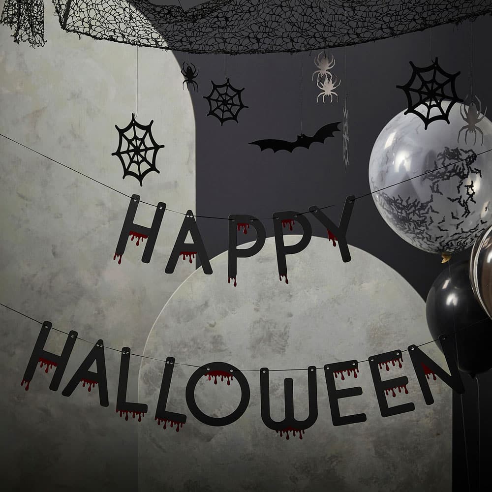 Halloween-banner med bloddrypende bokstaver i svart