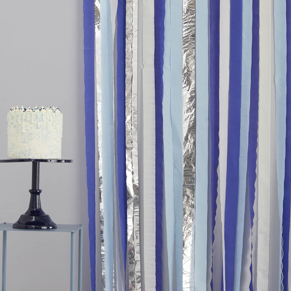 Crepe paper background in blue and silver