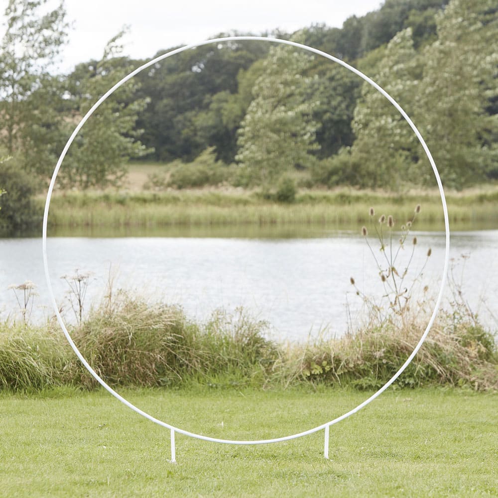 Round white stand / wedding arch