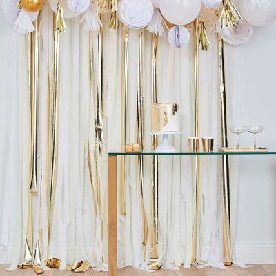 Crepe paper background in cream white and gold
