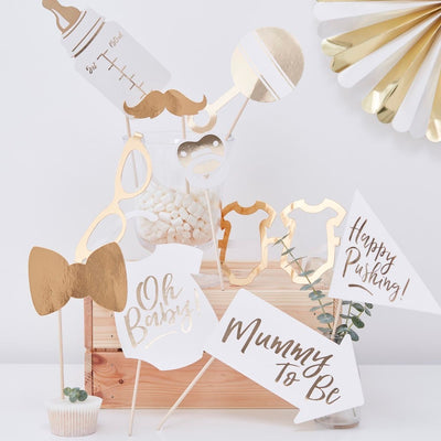 Babyshowerrekvisitter i gull